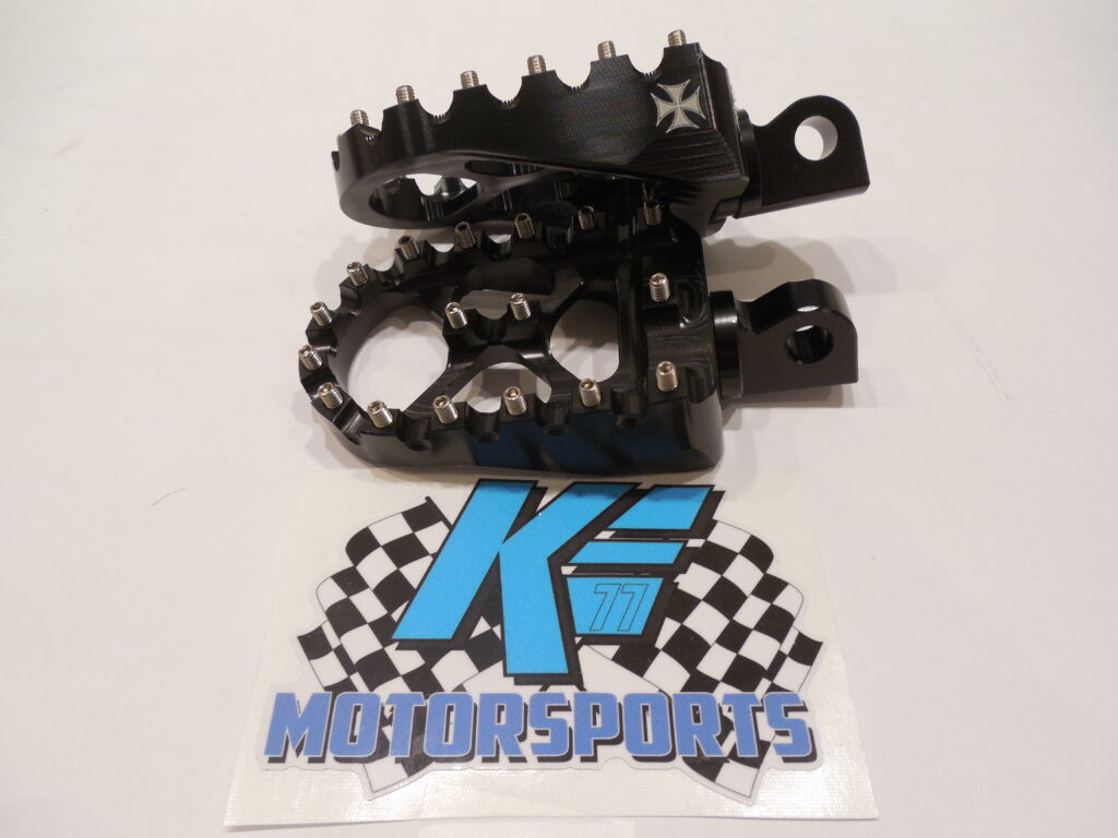 Wide moto-style foot pegs for Sportster and Dyna